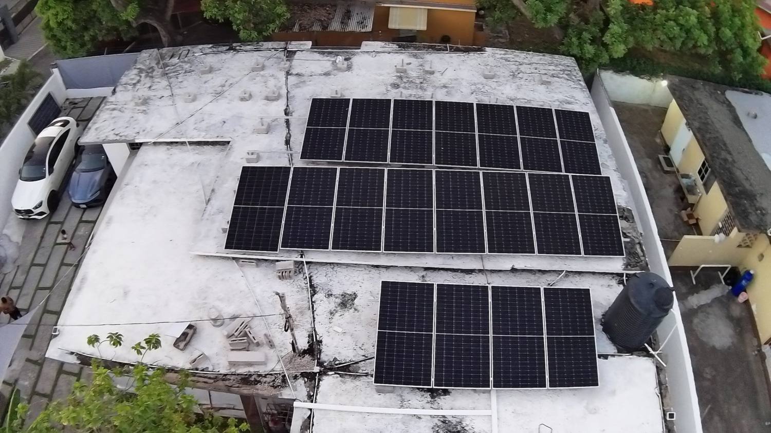 Aerial view of a Comfort Energy solar rooftop installation